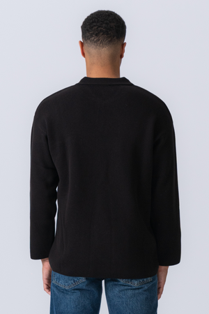 Gebreide polo met lange mouwen - zwart