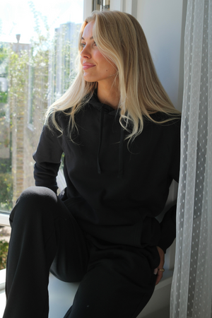 Essentiële hoodie - zwart